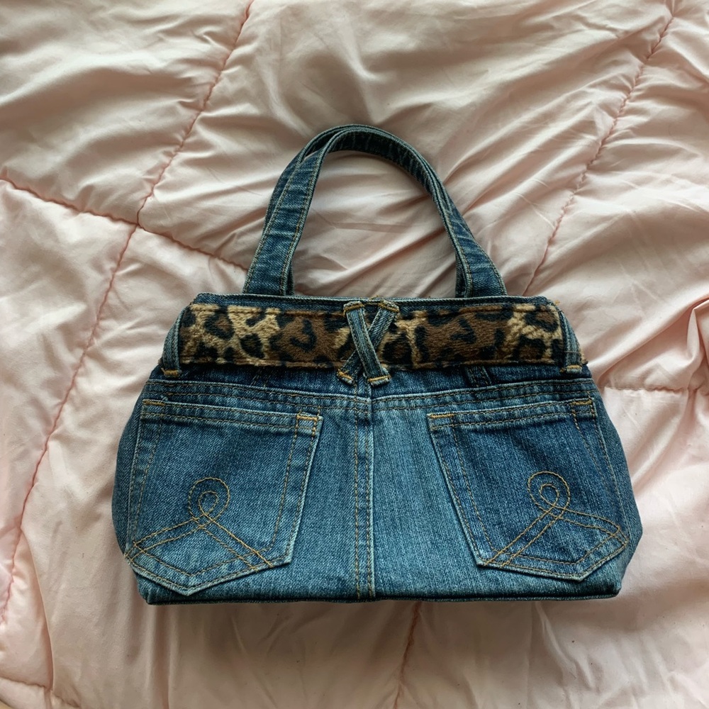 stylish handbag, small size but roomy space enough for personal belongings